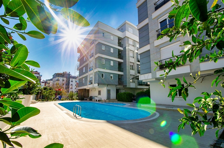 Квартира с придомовым бассейном планировки 2+1 в микрорайоне Хурма - Анталия 