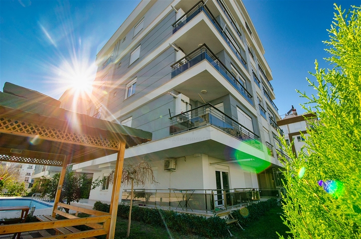 Квартира с придомовым бассейном планировки 2+1 в микрорайоне Хурма - Анталия 