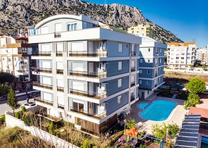 Квартира с придомовым бассейном планировки 2+1 в микрорайоне Хурма - Анталия 