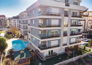 Квартира с придомовым бассейном планировки 2+1 в микрорайоне Хурма - Анталия 