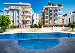 Квартира с придомовым бассейном планировки 2+1 в микрорайоне Хурма - Анталия 