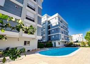 Квартира с придомовым бассейном планировки 2+1 в микрорайоне Хурма - Анталия 