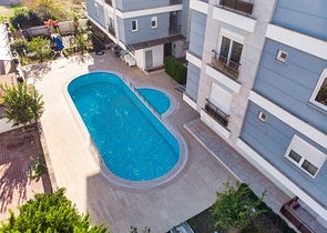 Квартира с придомовым бассейном планировки 2+1 в микрорайоне Хурма - Анталия 