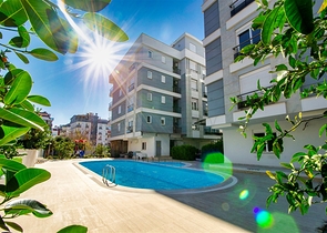 Квартира с придомовым бассейном планировки 2+1 в микрорайоне Хурма - Анталия 