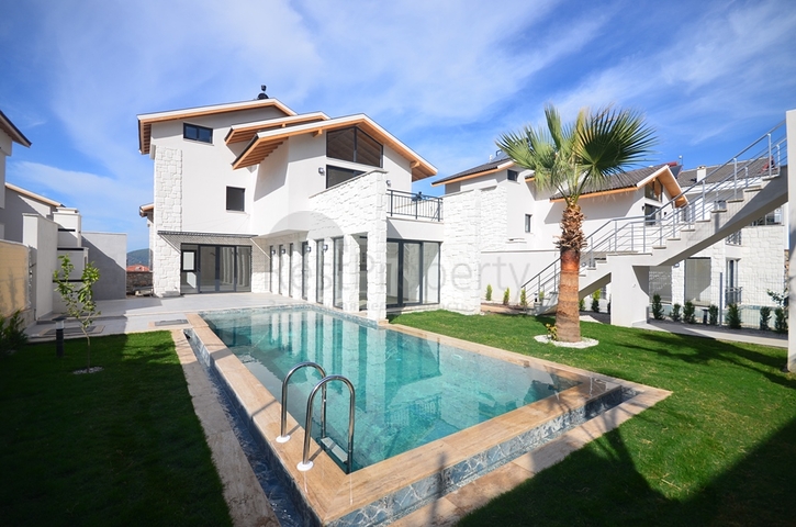 Вилла планировки 3+1,5+1 в районе Фетхие 