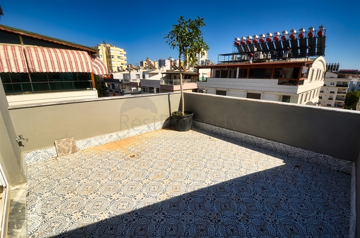 Квартиры планировки 4+1 в центре города Анталия 