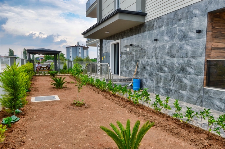 Здание, имеющее 4 квартиры в районе Дошемеалты - Анталия 