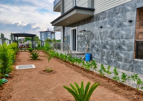 Здание, имеющее 4 квартиры в районе Дошемеалты - Анталия 