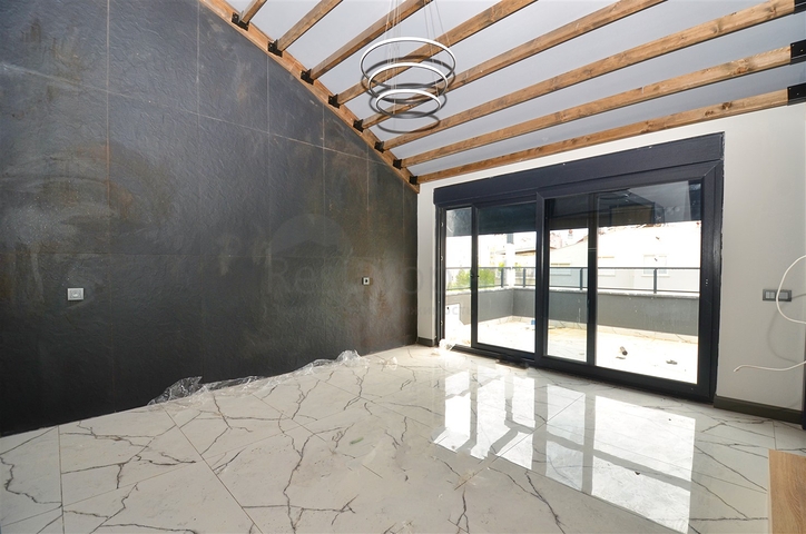 Квартиры планировки 2+1 и 3+1 в микрорайоне Ешильбахче - Анталья