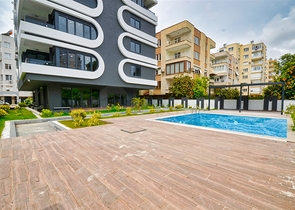 Квартиры планировки 2+1 и 3+1 в микрорайоне Ешильбахче - Анталья