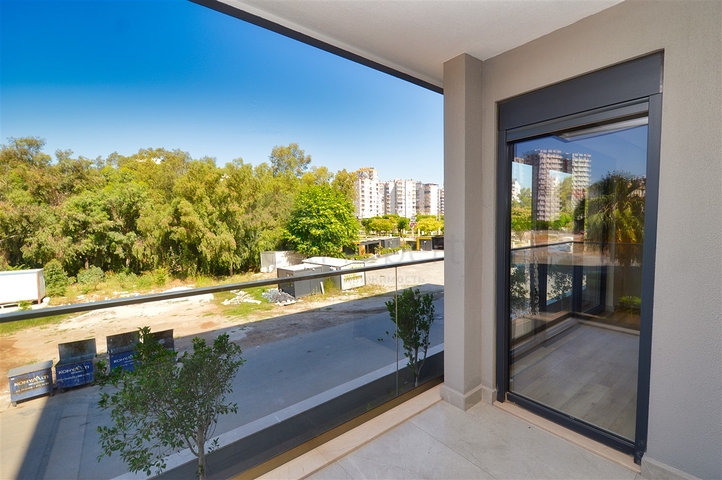 Квартира планировки 3+1 в микрорайоне Унджалы - Анталия 