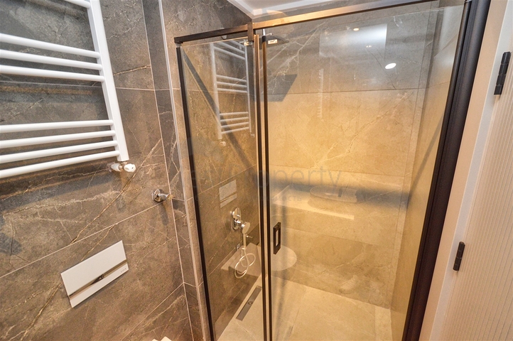 Квартира планировки 3+1 в микрорайоне Унджалы - Анталия 