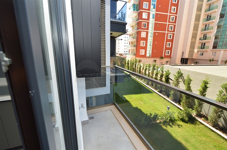 Квартира планировки 3+1 в микрорайоне Унджалы - Анталия 