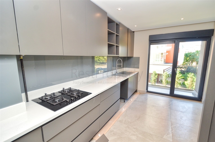 Квартира планировки 3+1 в микрорайоне Унджалы - Анталия 