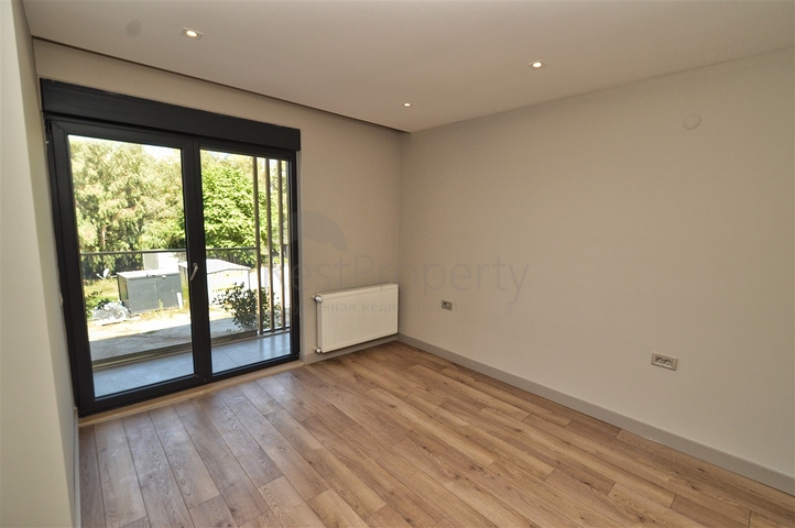 Квартира планировки 3+1 в микрорайоне Унджалы - Анталия 