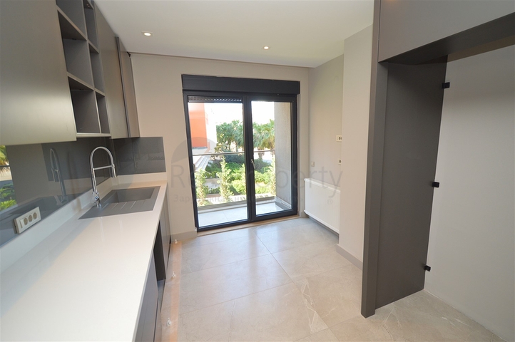 Квартира планировки 3+1 в микрорайоне Унджалы - Анталия 