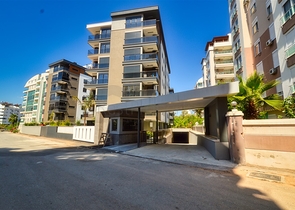 Квартира планировки 3+1 в микрорайоне Унджалы - Анталия 