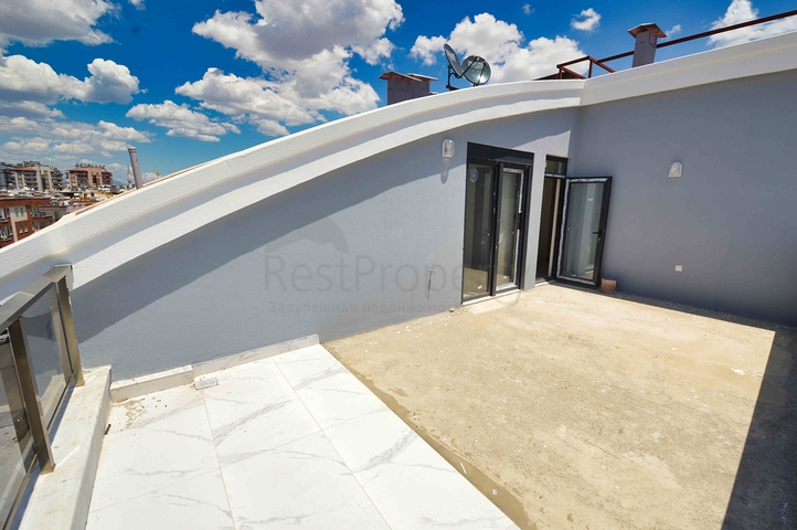 Квартира планировки 3+1 дуплекс в центре города Анталия 