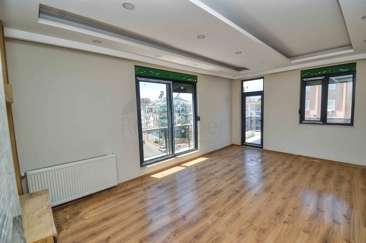 Квартира планировки 3+1 дуплекс в центре города Анталия 