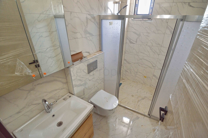 Квартира планировки 3+1 дуплекс в центре города Анталия 