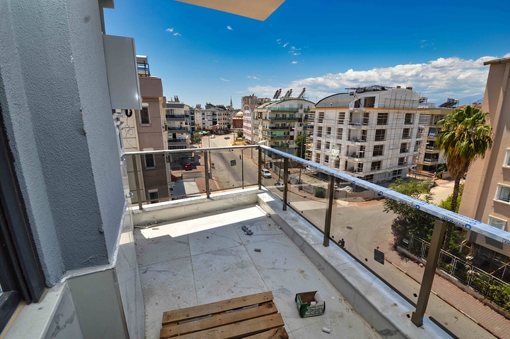 Квартира планировки 3+1 дуплекс в центре города Анталия 