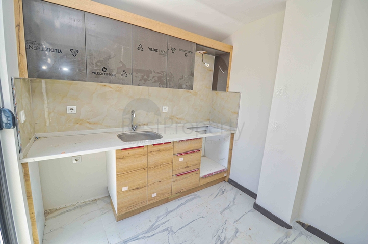 Квартира планировки 3+1 дуплекс в центре города Анталия 