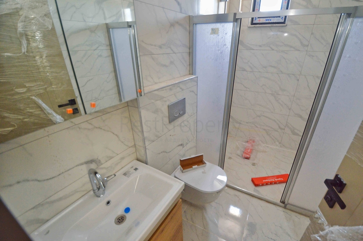 Квартира планировки 3+1 дуплекс в центре города Анталия 