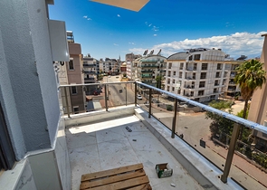 Квартира планировки 3+1 дуплекс в центре города Анталия 