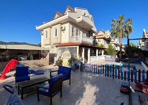 Вилла с видом на море планировки 4+1 в районе Фетхие 