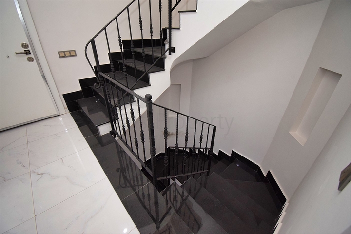 Вилла планировки 6+2 в микрорайоне Моллаюсуф - Анталия 