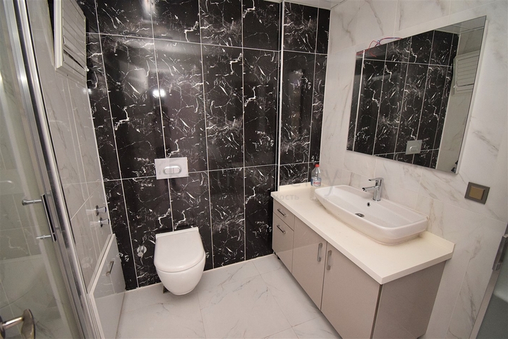 Вилла планировки 6+2 в микрорайоне Моллаюсуф - Анталия 