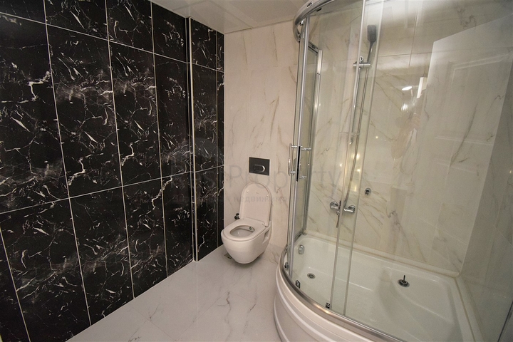 Вилла планировки 6+2 в микрорайоне Моллаюсуф - Анталия 