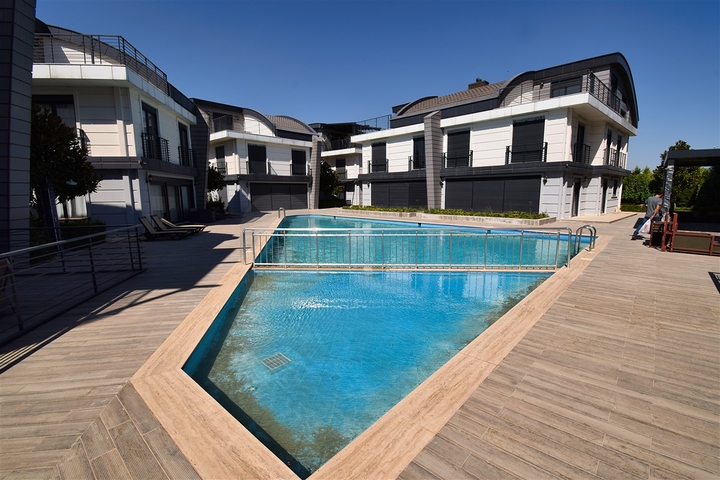 Вилла планировки 6+2 в микрорайоне Моллаюсуф - Анталия 