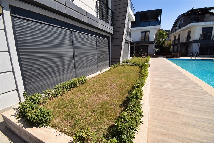 Вилла планировки 6+2 в микрорайоне Моллаюсуф - Анталия 