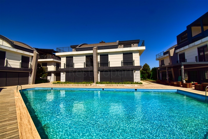 Вилла планировки 6+2 в микрорайоне Моллаюсуф - Анталия 