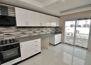 Просторная квартира планировки 3+1 в центре города Анталия