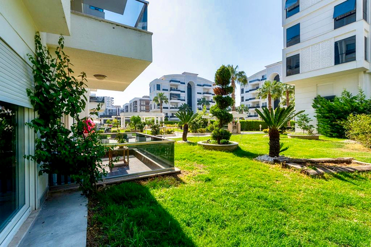 Квартира планировки 4+1 с мебелью в микрорайоне Унджалы - Анталия 