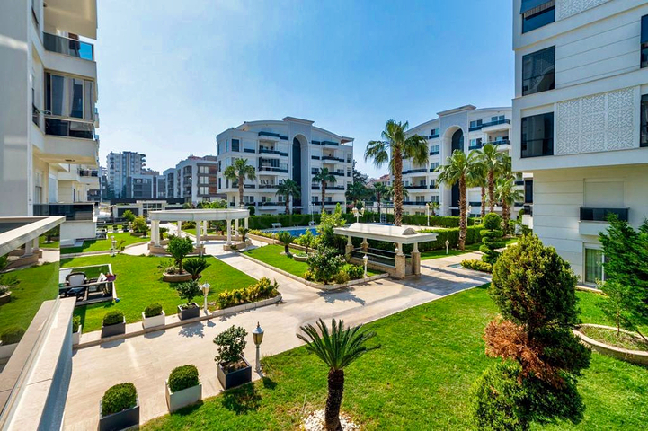 Квартира планировки 4+1 с мебелью в микрорайоне Унджалы - Анталия 