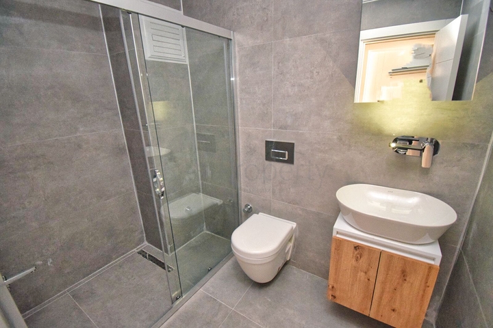 Квартира планировки 2+1 в микрорайоне Гюрсу - Анталия 