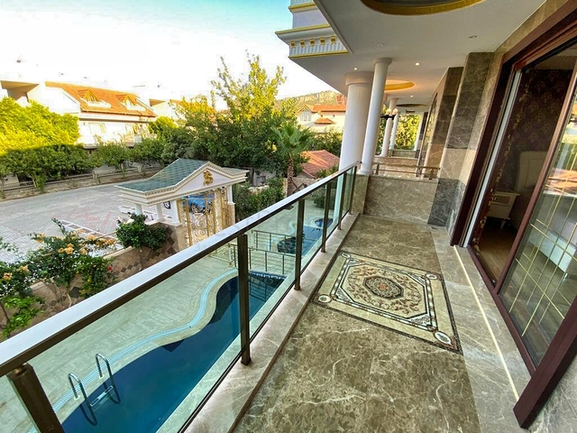 Просторная вилла планировки 6+1 в районе Кемер - Анталия 