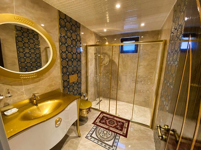 Просторная вилла планировки 6+1 в районе Кемер - Анталия 