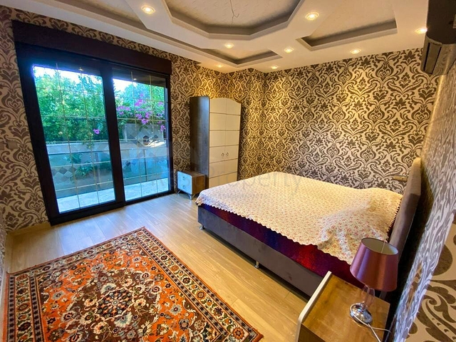 Просторная вилла планировки 6+1 в районе Кемер - Анталия 