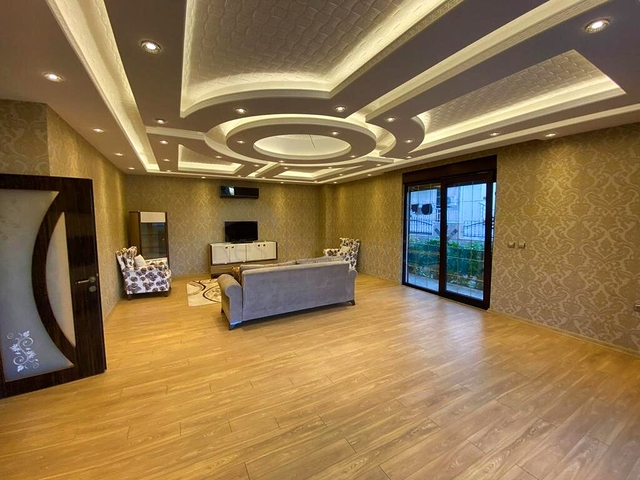 Просторная вилла планировки 6+1 в районе Кемер - Анталия 