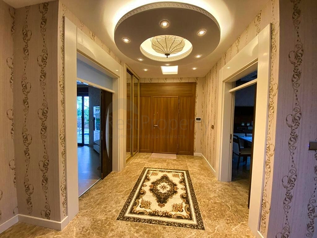 Просторная вилла планировки 6+1 в районе Кемер - Анталия 