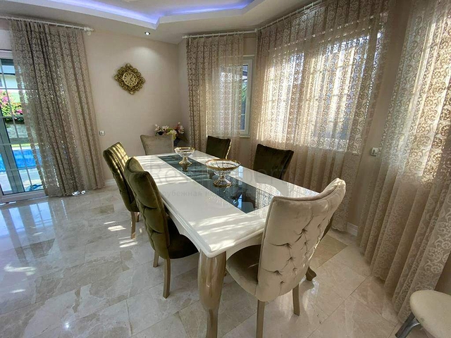 Вилла планировки 6+1 в районе Кемер - Анталия 