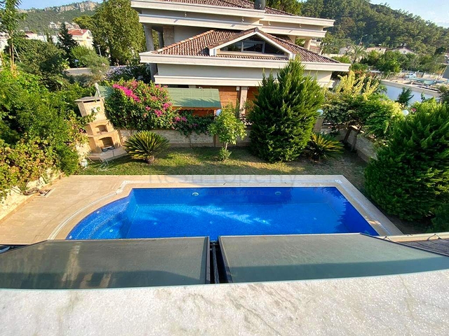 Вилла планировки 6+1 в районе Кемер - Анталия 