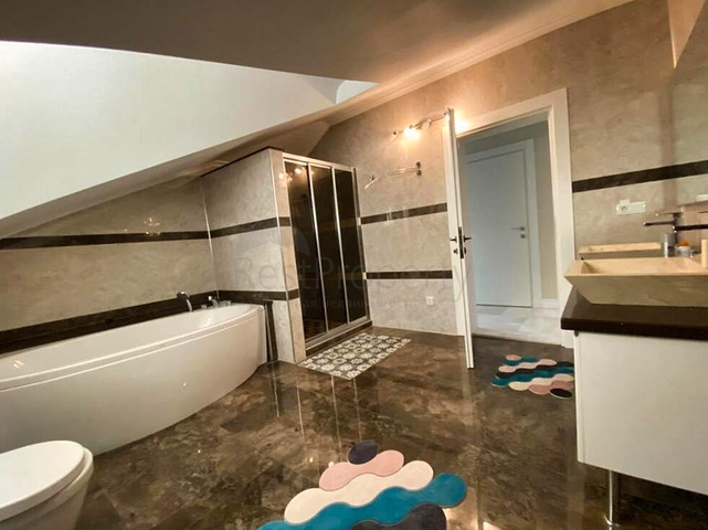 Вилла планировки 6+1 в районе Кемер - Анталия 