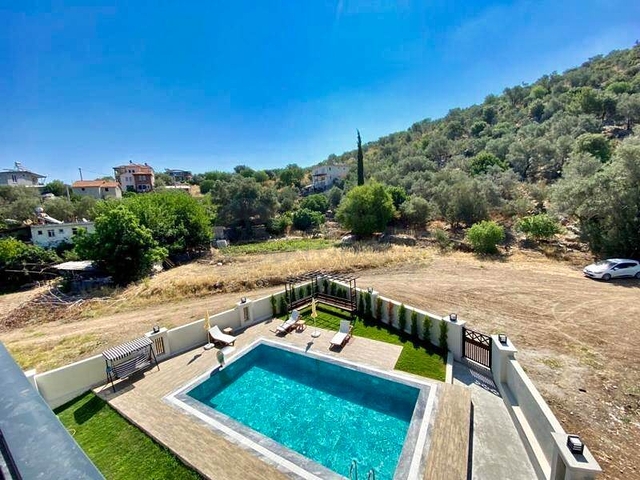 Квартира планировки 3+1 дуплекс в районе Фетхие 