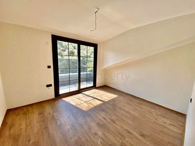 Квартира планировки 3+1 дуплекс в районе Фетхие 