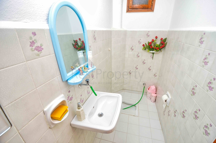 Квартира планировки 3+1 в центре города Анталия 